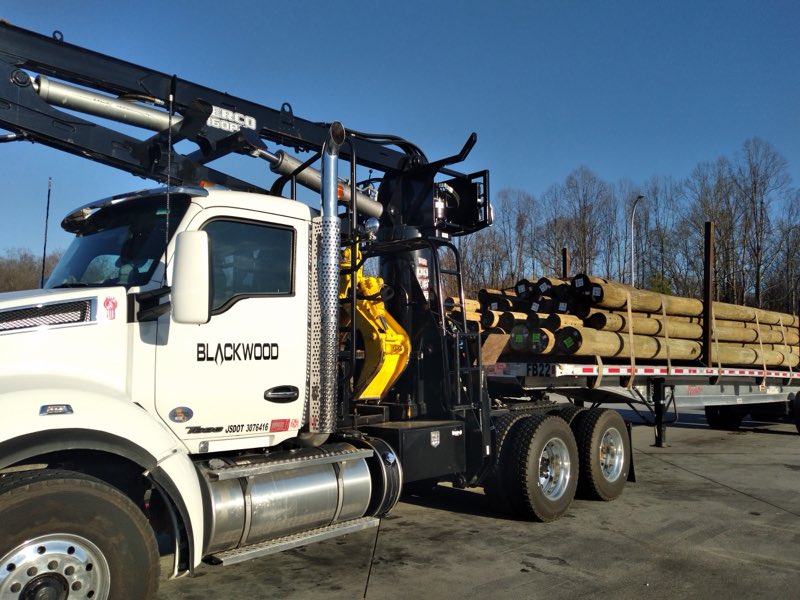 Blackwood logging truck with loader crane on the flatbed