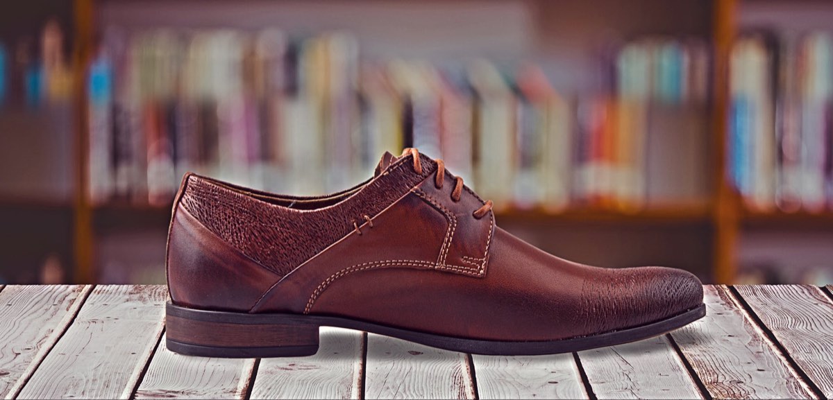 A polished brown leather dress shoe, the finished result of a repair at Gulf Gate Shoe Repair