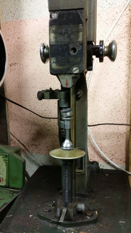 Traditional shoe press and sole-stitching equipment at Gulf Gate Shoe Repair