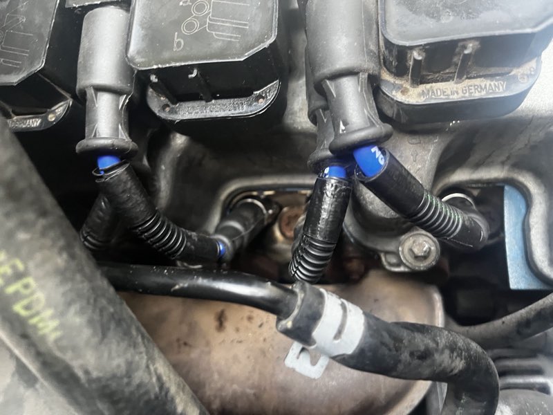 Detailed engine repair work with German-made ignition components
