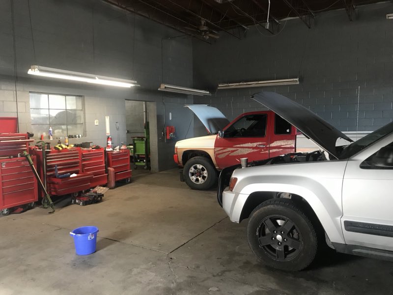 Shop interior with a truck in for work and tool chests