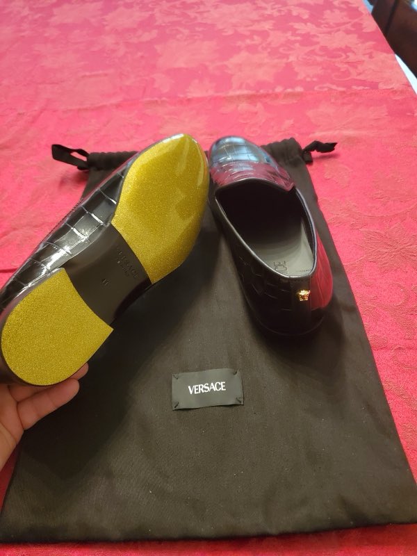 Versace shoes freshly resoled, shown with their dust bag