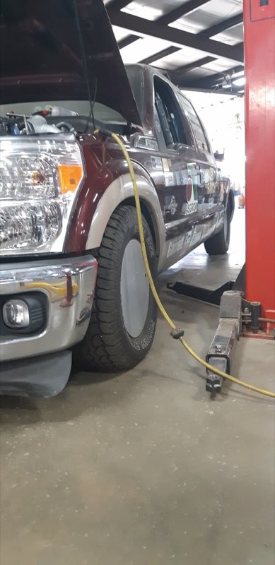 Truck up on the lift for service